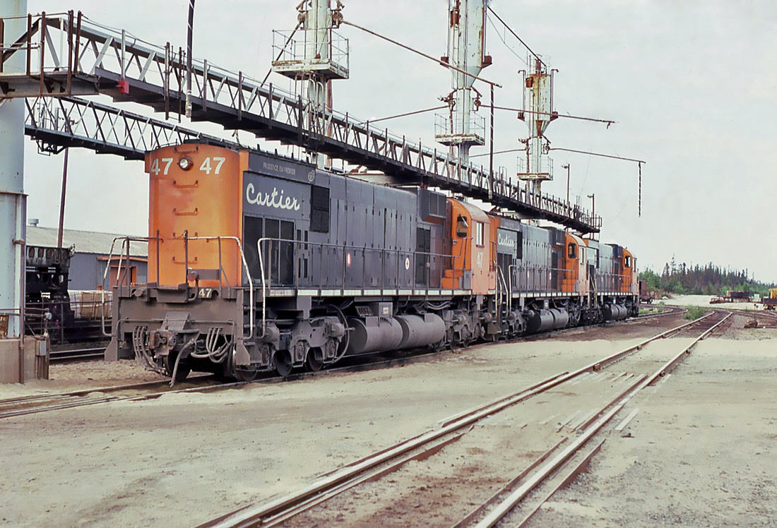 Cartier Railway MLW M-636 No.47 ex-CN 2312 with numbers 74, and 84; at the Port Cartier, Quebec diesel servicing Area August 10, 1986.