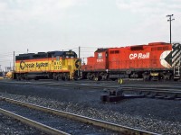 Chessie System B&O GP40 3720 and CP GMD GP7u 1501; nee 8409 at CP's Agincourt yard October 25, 1987.