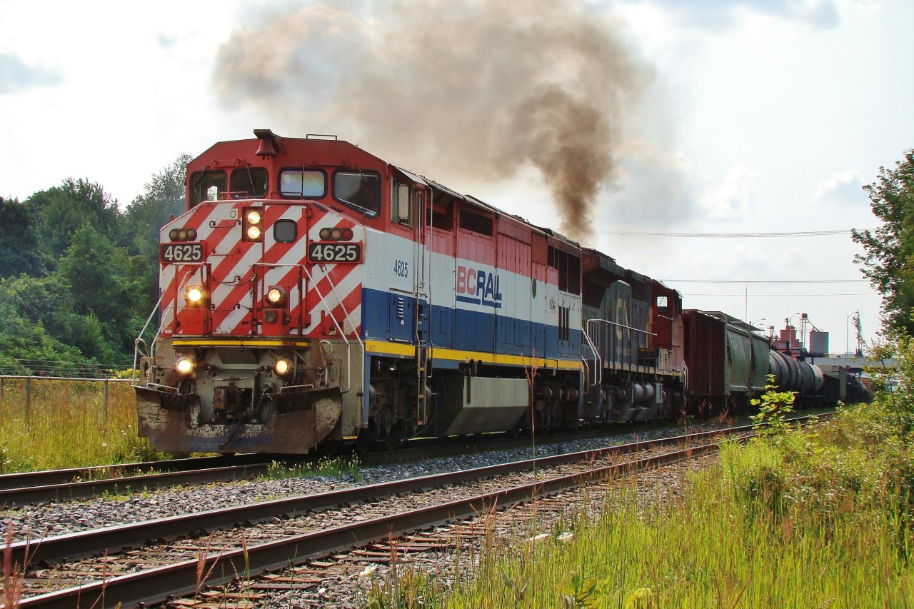 An eastbound manifest departs London bound for Toronto behind BC Rail 4625 and CN 2647.