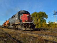 GEXR 432 heads eastbound through Guelph with 69 cars on the drawbar for CN at Mac Yard.  The last of the fall colours is almost upon us...soon the white stuff will be flying...