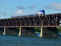 AMT 1329 leads AMT 72 over the St-Lawrence River on its way to its next stop at Lasalle station.