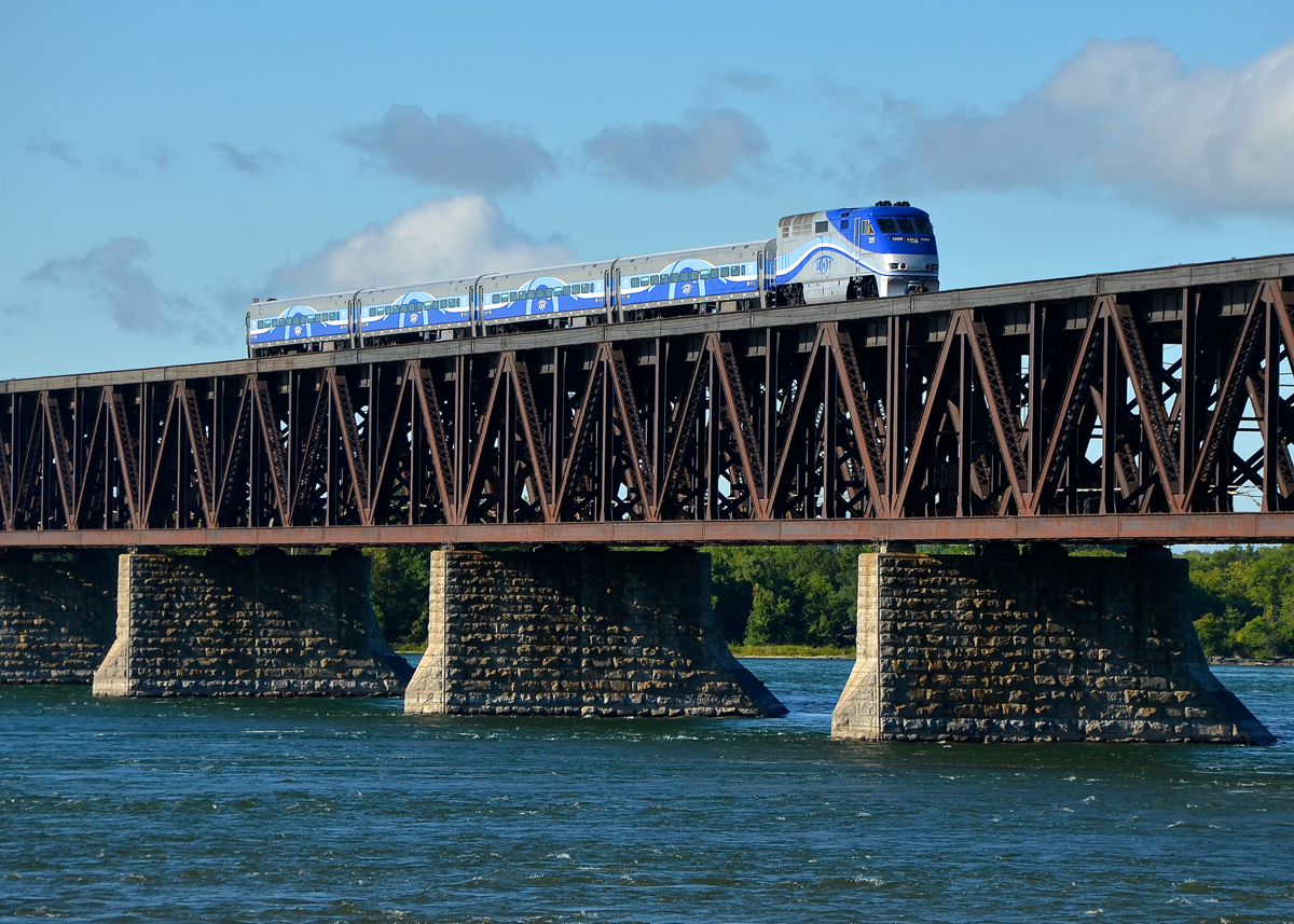 AMT 1329 leads AMT 72 over the St-Lawrence River on its way to its next stop at Lasalle station.