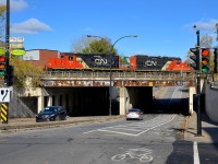 GP9's CN 7275 & CN 7075 are going back and forth over Wellington street as they work Pointe St-Charles Yard.