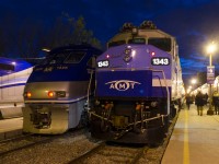 F59PHI AMT 1325 and F59PH AMT 1343 both have their class lights lit. These GMD veterans are ready to push AMT 93 and AMT 25 respectively away from downtown Montreal during the evening rush hour.