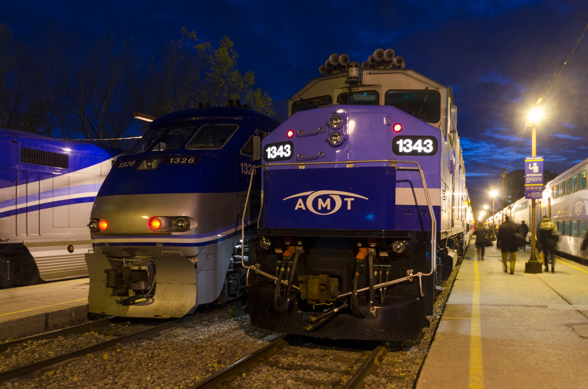 F59PHI AMT 1325 and F59PH AMT 1343 both have their class lights lit. These GMD veterans are ready to push AMT 93 and AMT 25 respectively away from downtown Montreal during the evening rush hour.
