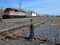 The Bangor & Aroostook heritage unit (CMQ 9017, an ex-CP SD40-2F) is in Quebec for the first time as it lays over in Farnham after arriving on CMQ 1 overnight. Trailing is LTEX 2535 as the 28-car sits in Farnham Yard.