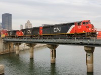 CN 149 is crossing the Lachine Canal in Montreal with CN 2415, CN 5437 & IC 2712 for power. Of note is that CN 2415 is a wreck rebuild, twice over. It was wrecked in November 1996 and in December 2002 and repaired both times.