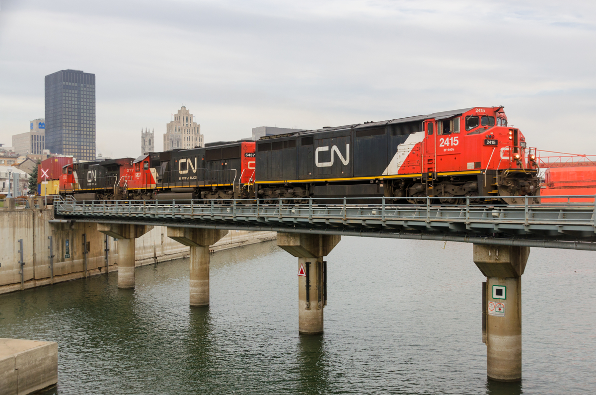 CN 149 is crossing the Lachine Canal in Montreal with CN 2415, CN 5437 & IC 2712 for power. Of note is that CN 2415 is a wreck rebuild, twice over. It was wrecked in November 1996 and in December 2002 and repaired both times.