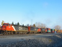 CN 149 is through the St-Henri neighbourhood of Montreal with Dash8-40CM's CN 2415 & CN 2436 and Dash9-44CWL CN 2503, all with Canadian cabs, on an on and off foggy/sunny morning.
