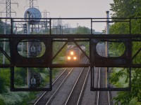 CEFX 1051 is framed by the signals on CP's Adirondack sub as CP 550 gets a new crew.