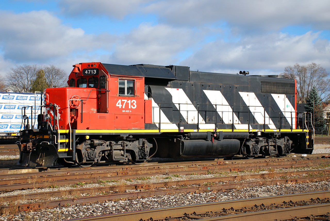 CN 4713 is arguably the best looking locomotive still in "zebra stripes" remaining on the active roster.  It was oddly repainted in the old scheme in 2007, long after the mid-nineties CN North America paint scheme, and the switch back to the CN "noodle" scheme.  4713 has been assigned to 580 for the past couple of weeks, and the unit was nicely posed in the yard today while the crew took a lunch break.
