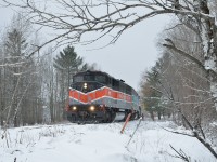 Central Maine & Quebec's now famous BAR Heritage unit led a Farnham-Sherbrooke turn on Wednesday Nov 23, 2016. It's shown here lifting two cars at Foster, QC on the eastbound trip.