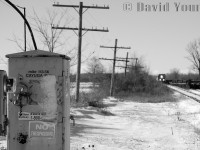 Trillium's HR412W 3582 crawls along the Cayuga Sub approaching the defective crossing at Belmont Road. In the siding sits a string of stored frame cars.