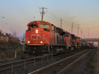 First day using my EOS 7D turned out to be a good one. Capping the day off with a pan shot of 399 at Mt. Pleasant. This shot, although may not look similar, was inspired by Stephen Host's shot of a westbound at Puslinch featured here: http://www.railpictures.ca/?attachment_id=23106 . I learned to make the most out of low light situations, and to try new things out.