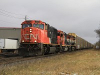 During a break of on and off snowstorms, 371 flies through Woodstock on the south track after meeting 148 seconds before. I'm very fortunate that the sun just barely broke through the thick cloudcover, and made the shot a ton better.