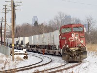 It's a bitterly cold Valentines Day as a fresh crew have arrived to finally take "Expressway " train 133 the last few miles to Hornby yard. The night before issues on the Hamilton sub. Forced a Buffalo bound stack train to out law at Hornby yard, which in turn forced train 133 to outlaw only a few miles from its destination. The crew arrived in the mid afternoon to move the train before the evening GO train rush, here we see the brakeman knocking off hand brakes just prior to the train departing.
