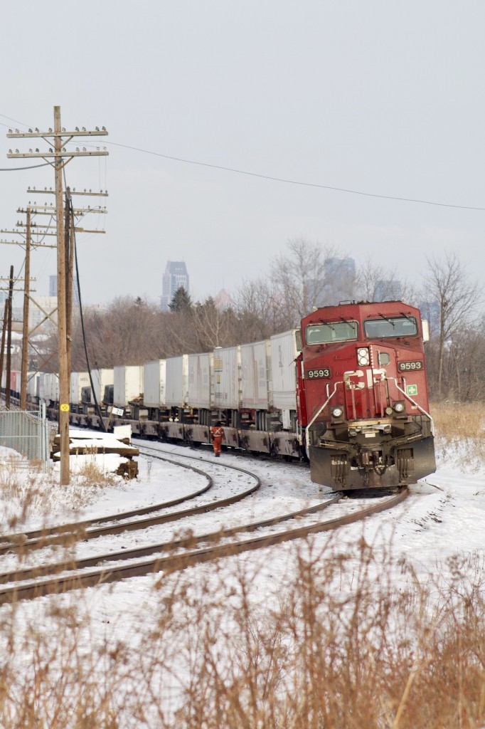 It's a bitterly cold Valentines Day as a fresh crew have arrived to finally take "Expressway " train 133 the last few miles to Hornby yard. The night before issues on the Hamilton sub. Forced a Buffalo bound stack train to out law at Hornby yard, which in turn forced train 133 to outlaw only a few miles from its destination. The crew arrived in the mid afternoon to move the train before the evening GO train rush, here we see the brakeman knocking off hand brakes just prior to the train departing.