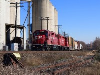 Another Monday's call to duty finds CP T14 stopping to switch out the large Ardent Mill in Streetsville. The ADM spur sits dormant to the right. 