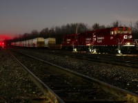 With red signals in the distance, all is quiet at Guelph jct. with the exception of the "London Pick Up" as its trio of EMD's idle the early morning hours away. The future of the train is very questionable with the possible reinstatement of the old "Guelph Jct. Turn" in the near future, based in Toronto. 