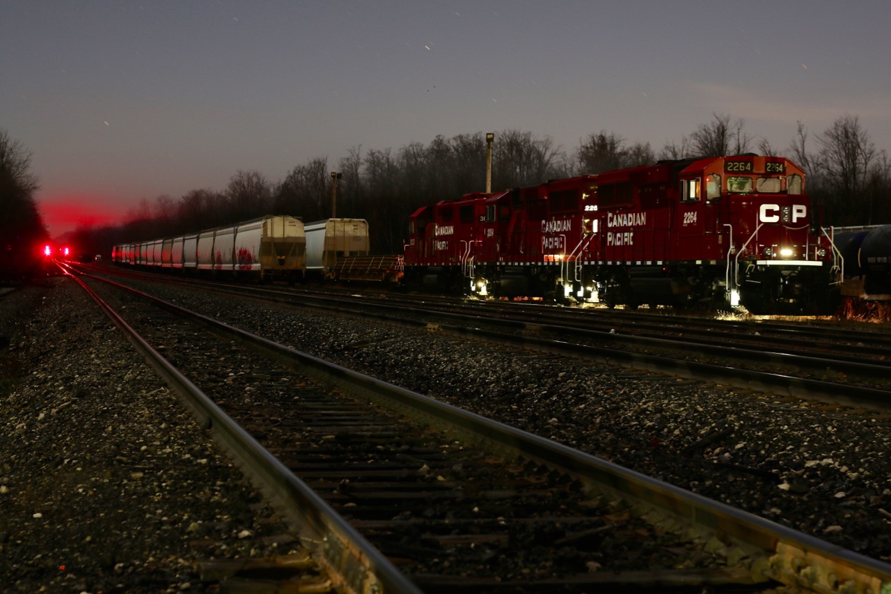 With red signals in the distance, all is quiet at Guelph jct. with the exception of the "London Pick Up" as its trio of EMD's idle the early morning hours away. The future of the train is very questionable with the possible reinstatement of the old "Guelph Jct. Turn" in the near future, based in Toronto.