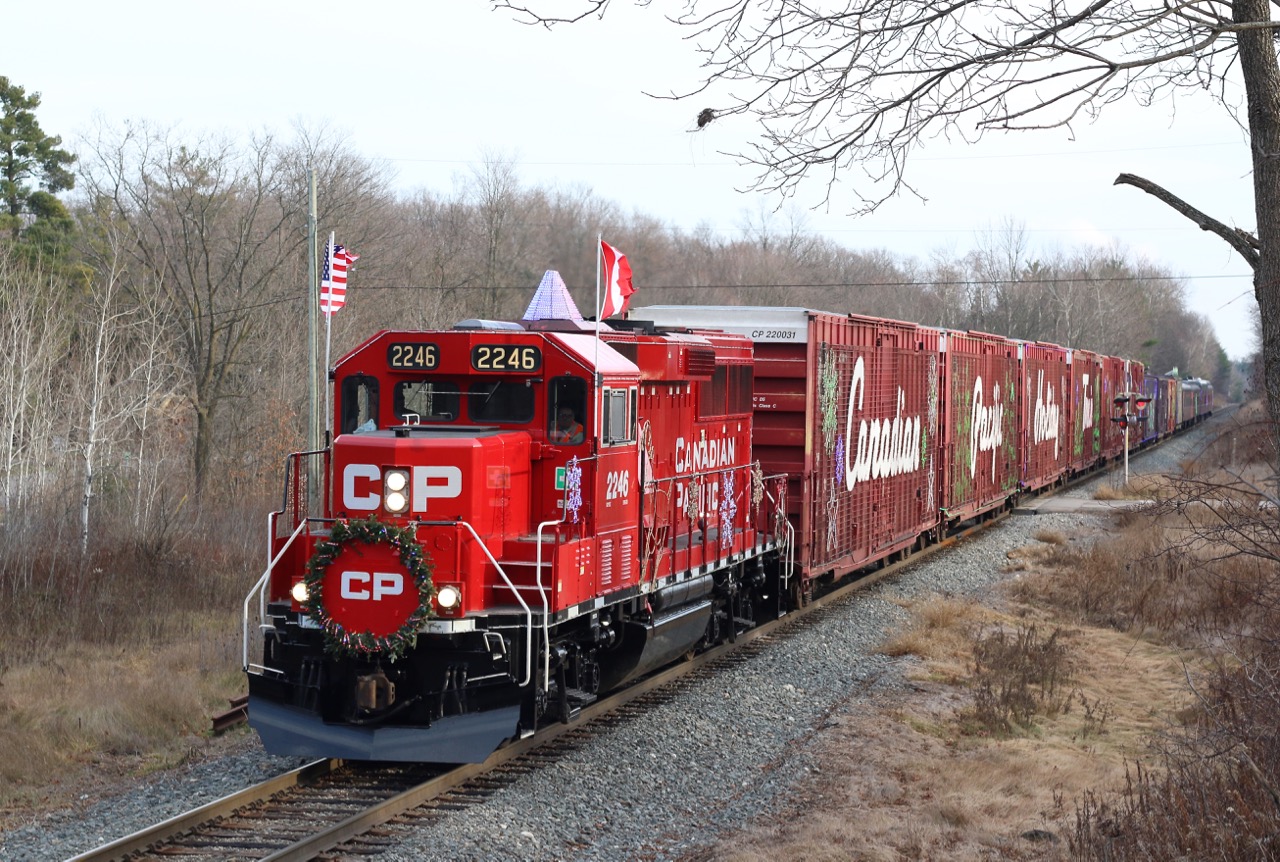 I honestly thought I had no chance of catching the (American) CP Holiday Train today, but luck was on my side with 15 mins to spare as the train approached Guelph Jct. The sun even broke through the clouds briefly as the train passed. While the train looks best in the dark, it is nice to occasionally photograph the whole consist in daylight. :) From here the train picked up a few passengers at the Junction before having a meet with train 254 at Puslinch, then off to put on a show at Galt.