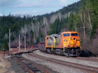 QNS&L southbound with loaded iron ore cars, AC4400CW 418 and SD70ACe 504 waiting for a northbound at Doree, Québec April 16, 2010. 