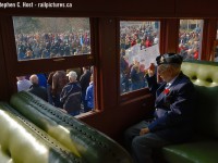 <b> We will Remember them: </b> Sitting in 1923 built heavyweight coach CPR 1437 "Midway" - A member of the 404 Wing of the R.C.A.F.A (Waterloo) observes a sombre moment during ceremonies to remember those who paid the ultimate price fighting for our freedom, past and present. He remembers. We will remember them.