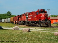 CP's St. Thomas Subdivision: This was a sleepy line for railfans - despite having eight trains a day through this exact spot  - the fans didn't go out for it much. Now, they come out in droves for the famous Ontario Southland Railway. In this photo the crew are making comments about the photographer as I had chased from Woodstock, to Putnam and they are making a lift from the OSR interchange before returning to Woodstock (in total about a 4 hour job on this day) - and if any in this crew work for OSR now (High probability they do!)... photographers  are the norm :)<br><br>My oldies again.. yeah.. 10 years ago :) Nothing like Arnold, Larry's, or Bill's but hey, it's history.