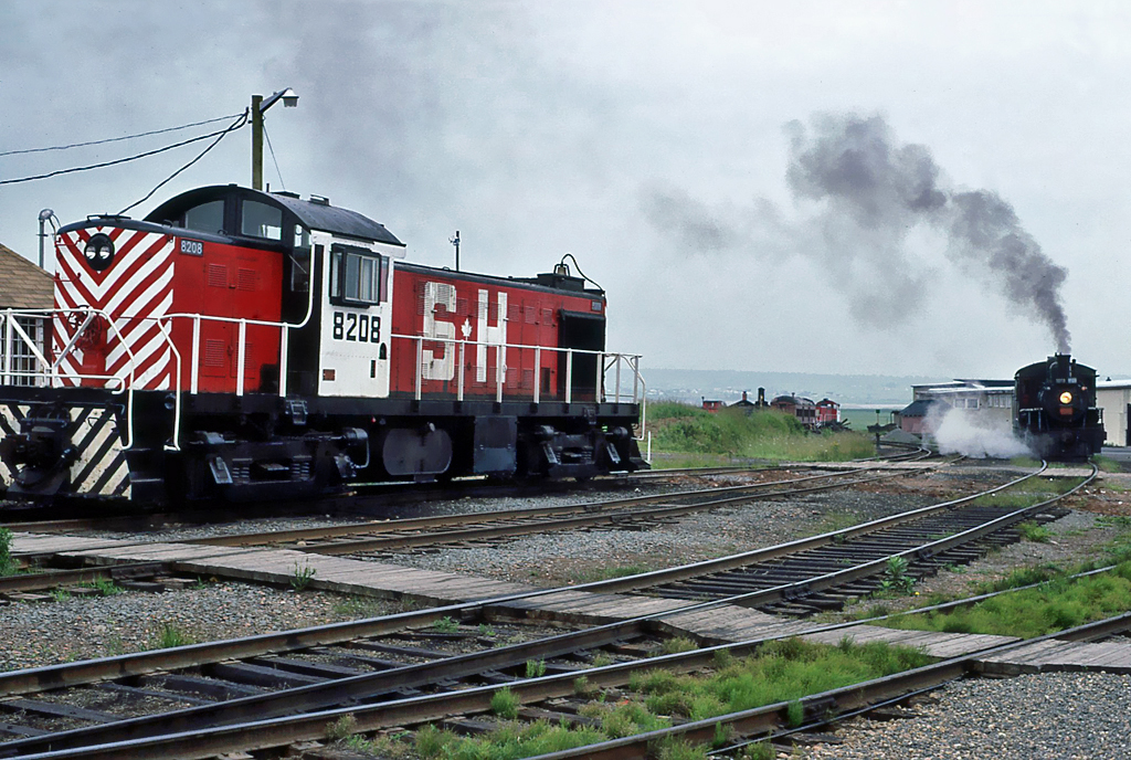 Salem & Hillsborough Railroad Alco RS-1 No.8208 with Canadian National MLW Steam 4-6-0 No.1009. July 10, 1988.