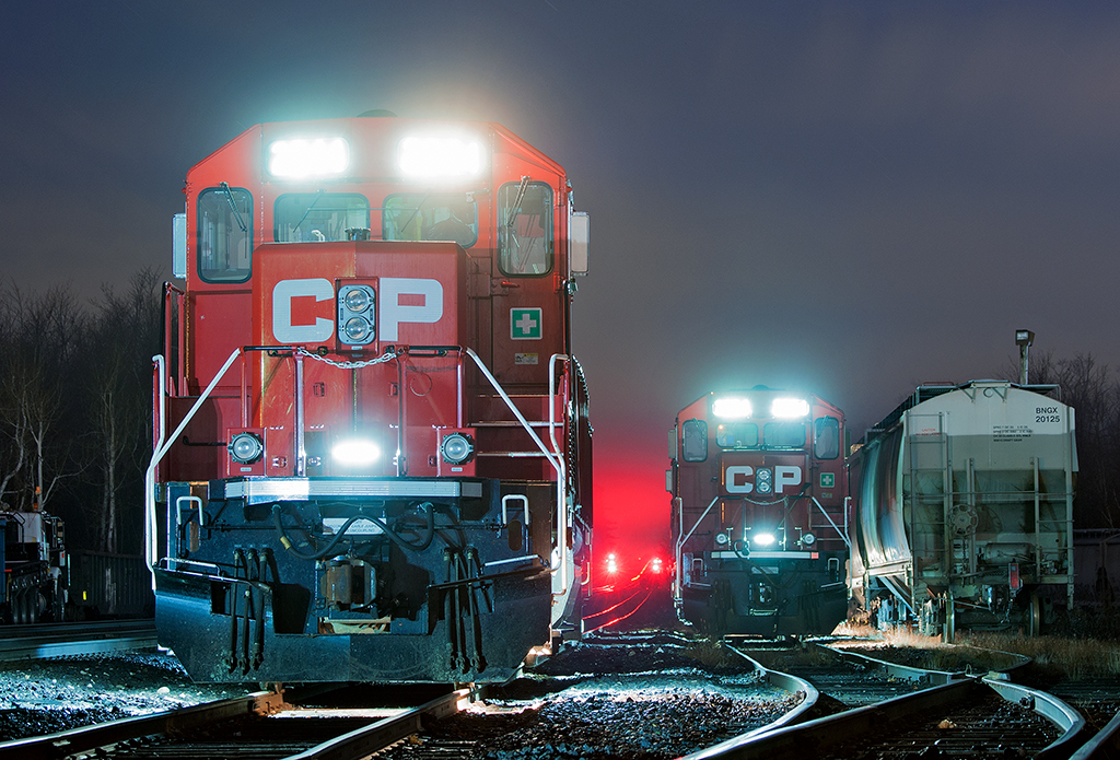 It's a chilly fall night, the echoing enchantment of 8 cylinder 710 series prime movers idle through the air. On our left, CP 2244 sits by her lonesome after being switched off the TEC train due to the computer screen on the control stand going bad, beside her is the London Pickup tied up for the night as the crew rests in the hotel a few miles to the east.