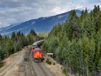 Still quite new, CN ET44AC 3105 leads a westbound loaded potash train down predominantly eastbound only trackage on CN's Albreda Sub. With low eastbound traffic this morning, the dispatcher was able to run this guy down the less steep and shorter route between Redpass and Valemount. Normally this train would head down the steep Robson Sub which is near impossible to get a train up they way CN runs their trains underpowered these days.