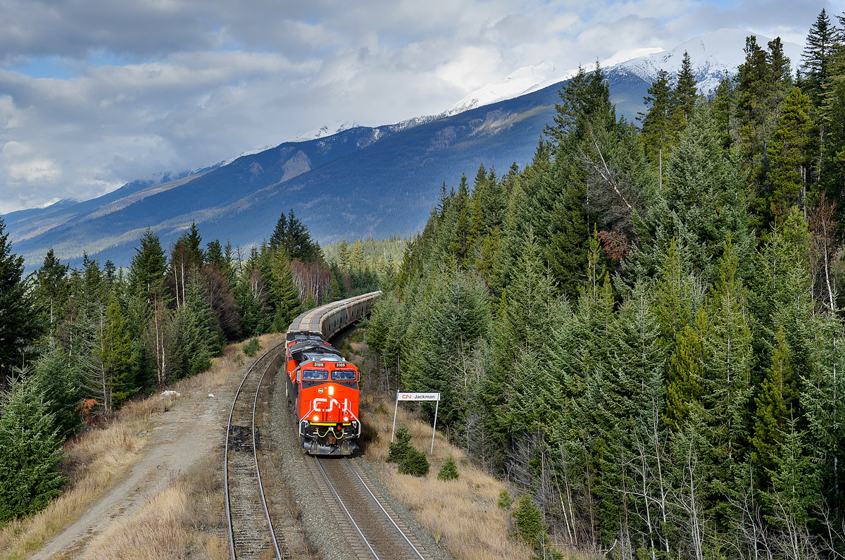Still quite new, CN ET44AC 3105 leads a westbound loaded potash train down predominantly eastbound only trackage on CN's Albreda Sub. With low eastbound traffic this morning, the dispatcher was able to run this guy down the less steep and shorter route between Redpass and Valemount. Normally this train would head down the steep Robson Sub which is near impossible to get a train up they way CN runs their trains underpowered these days.