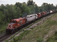A nice mix of power handles an extra east at Ajax. CP 8921 was no longer in captive service in Toronto And was just another road unit. The 2 ex KCS SD40-2,s had just been purchased and awaiting there red CP Rail decals. It may not have been sunny for the perfectionists but ? ?  8921 is preserved in St Thomas Ontario at the Elgin county railway museum. 