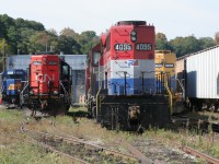 This photo is a great example of how a time span of 8 years can really make a difference in the railway industry. Taken down in the "Hammer" in October 2008, at Stuart St. Yard, rests quite the variety of power. From left to right: RLK 3873, CN 7001, RLK 4200 & slug RLK 1200 (behind the CN locomotive, out of view, uncoupled), RLK 4095 (now with GEXR and no longer with "RailAmerica" decals), GEXR 3835 (coupled to the 4095, out of view) and GEXR 3856. Wow! Many of the locomotives pictured here are no longer in Ontario in operation. Maybe CN 7001 is on the CN roster still, and RLK 4095 is, as of lately, coupled to QGRY 2008 powering the GEXR locals (518 and 580). This scene pictured here has also changed significantly, as evidence, see other RP.ca contributors' recent shots of this area.

I will admit, I do not have the extensive locomotive history knowledge like others do, for various reasons that I won't get into here. So, I welcome others to discuss their histories, if they see fit. 