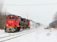 CN 5447 and 2161 do the honors and head east on M385.