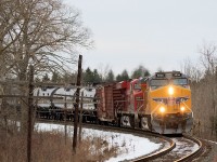 A pair of GE's take charge on this empty ethanol snake westbound through Southern Ontario. UP 5506, CP 8804 waste no time as they race across the countryside.