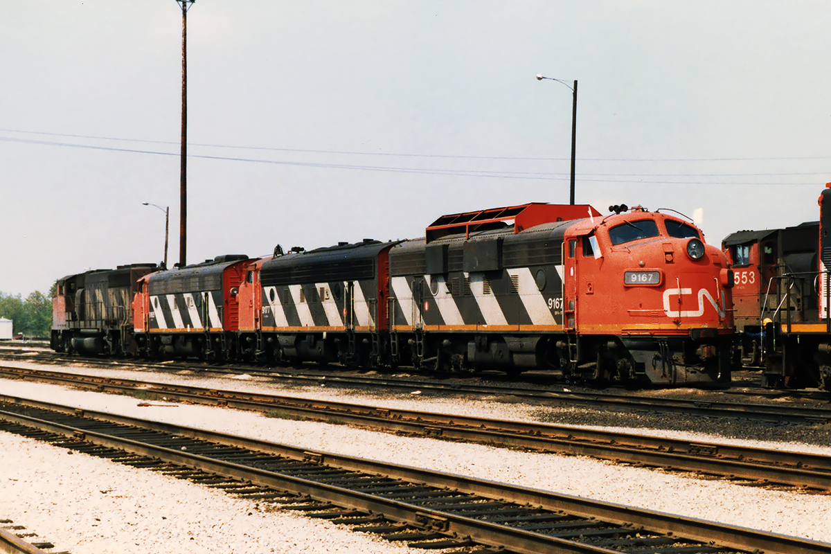 Mac Yard occasionally had some treasures.........Home from Stratford for a visit with 2 sisters and a GP40-2. I wonder where they went from here; chasing from work was usually out of the question.