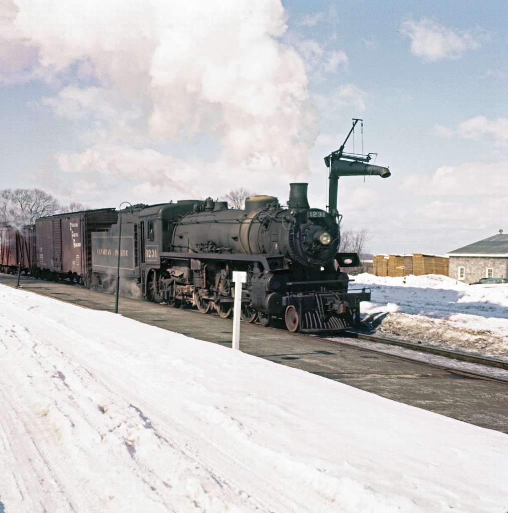 The late Mr. Del Rosamond records Pacific-type #1231 passing by the Pembroke Station.  Circa 1958.