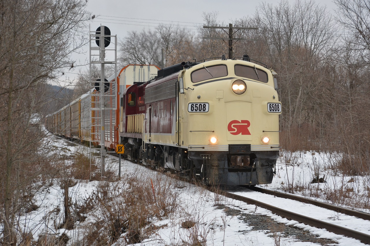 OSR's Woodstock Job crosses the CN diamond at Carew with autos to interchange with CP