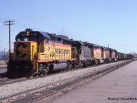 B&O 4341 leads C&O SC-5 past Windsor Depot on April 5th 1980 with phosphate rock empties on the head end. 