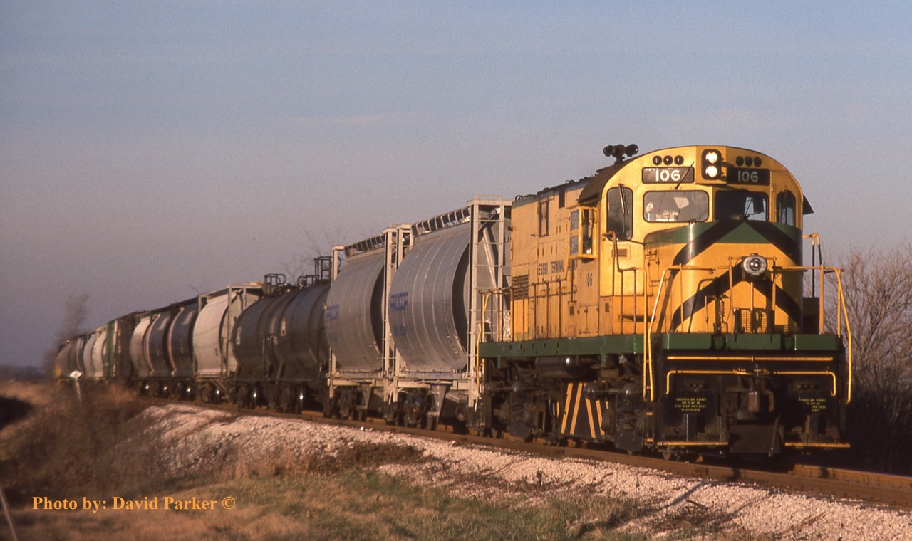 Essex Terminal Railway C-420 106 was always the power on the Daily afternoon Amhertsburg Turn. Here seen just North of Amherstburg with mostly traffic for Allied Chemical.