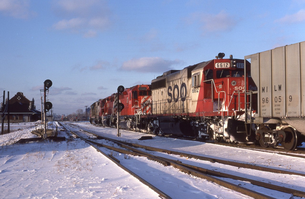 On a frigid December afternoon, CP 501 enters the CN Caso Sub North main track and heads past the station, down into the Detroit River Tunnel.