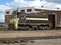 ArcelorMittal no.302 (wearing AARX reporting marks for movement)sits outside the former CN Gordon Yard diesel shop owned by Industrial Railway Services. It was one of several SW1500 units which IRSI was contracted to overhaul, repaint and equip with remote control equipment.