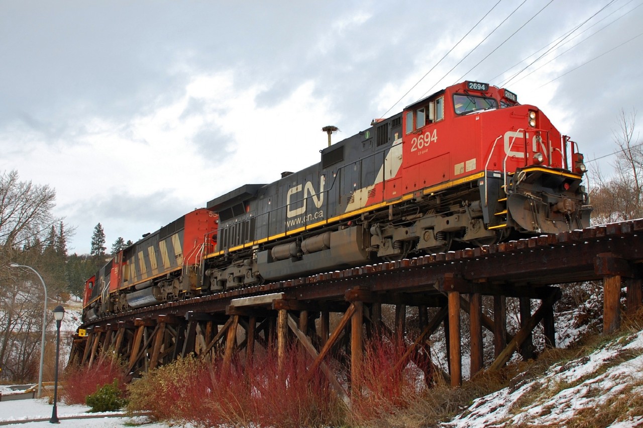 CN 2694 leads the way on to the wooden trestle which marks the start of the Lumby sub in Coldstream.