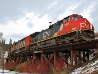 CN 2694 leads the way on to the wooden trestle which marks the start of the Lumby sub in Coldstream.