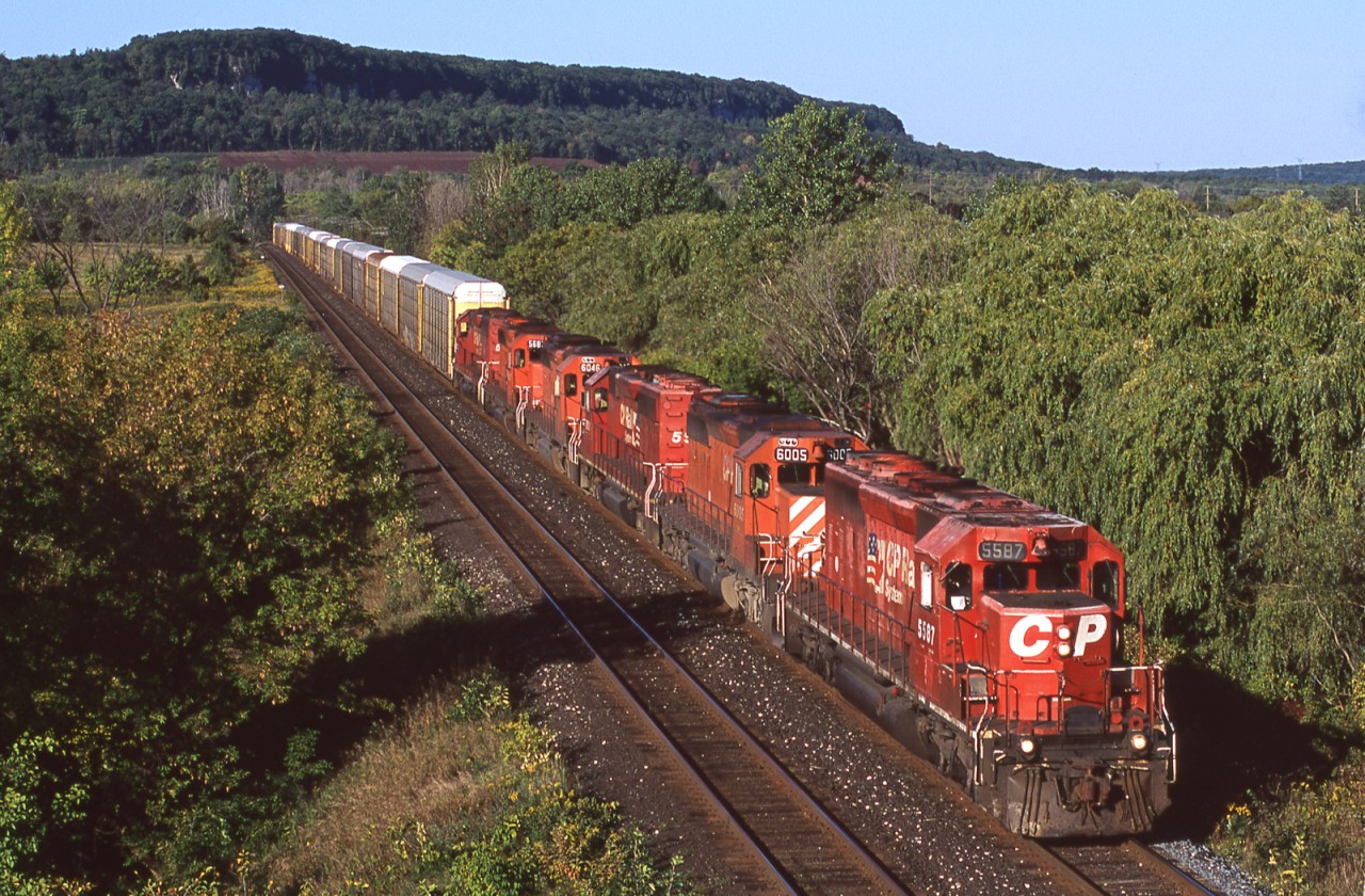 With all the talk of CP's dwindling SD40-2 fleet lately I thought a look back was in order. CP train 424 has a nice six-pack of SD40-2's and is about to duck under CN's Halton Sub in Milton Ontario. The unit #'s are 5587,6005,5958,6046,5687,5575.