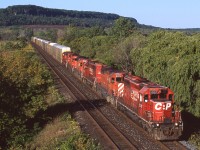 With all the talk of CP's dwindling SD40-2 fleet lately I thought a look back was in order. CP train 424 has a nice six-pack of SD40-2's and is about to duck under CN's Halton Sub in Milton Ontario. The unit #'s are 5587,6005,5958,6046,5687,5575. 