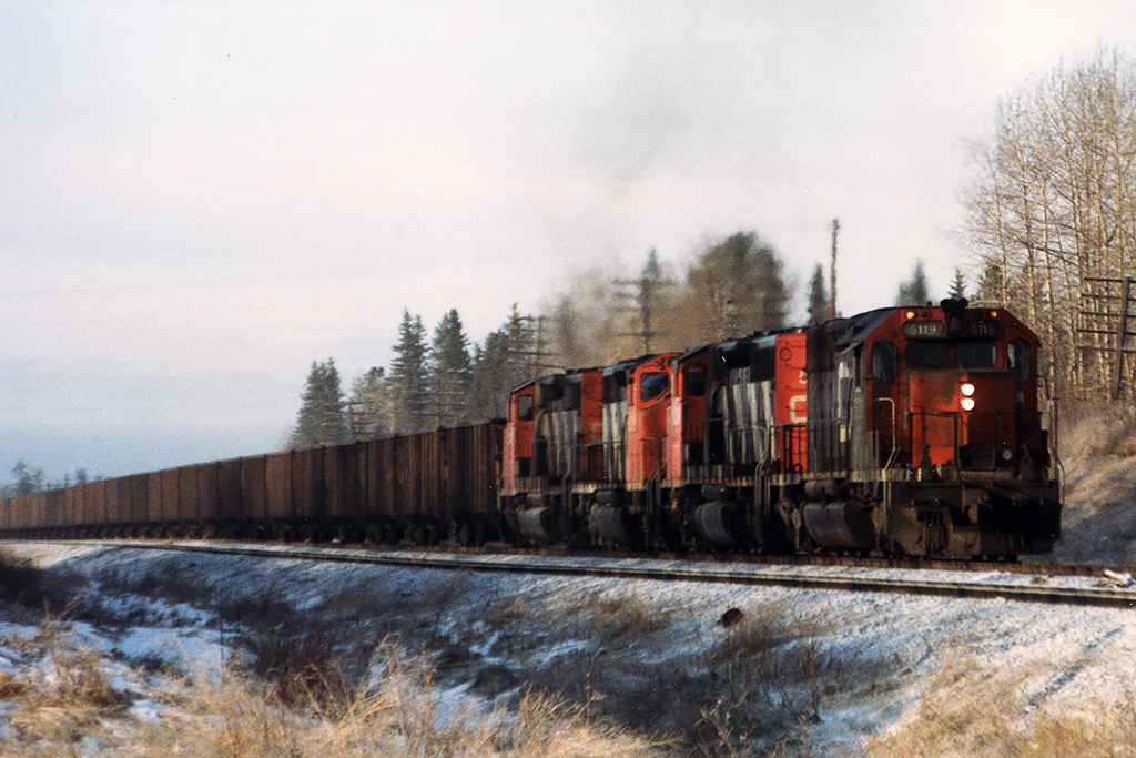 4 SD40's; with the olderst as leader bring 110 cars of Coal Valley coal for Thunder Bay into Edson. Power will be changed in Edmonton, so there's a cool 130 miles coming for the next crew.