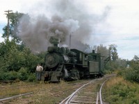 Acadia Coal Company 2-6-0 42 handles a steam crane at their colliery (mine) in Stellarton, Nova Scotia in August 1961. The crane was working on some trackage in the yard, and 42 is shown here taking her back to the shop in the late afternoon.
<br><br>
Build by Alco (Schenectady NY) as Dominion Coal 2-6-4T 16 in 1899, the unit became Sydney & Louisburg 42 not long after in 1901 (who eventually converted it into a 2-6-0). 42 was sold to the Acadia Coal Company in 1955, used to switch and handle coal hoppers at their mine operations. After acquisition by a private owner in 1963, and operation on tourist railroads Cape Breton Steam Railway, and the Salem & Hillsboro, 42 was donated to (and currently resides at) the Nova Scotia Museum in Stellarton, NS in 1983.
<br><br>
(Original photographer George Schaller, duplicate slide from the collection of Bill Thomson and posted on behalf of and with Mr. Schaller's full participation).