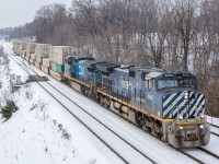 <b>Blue Christmas...</b> On a misty Christmas Eve, Canadian National hotshot train no. 148 cruises through Bayview Junction behind a pair of big blue GEs. This train made for a nice 'early Christmas gift', as I was en-route to the mall to finish some last minute shopping when I paid a brief visit to the Junction.

I hope everyone has a very merry Christmas, and the only thing blue is the locomotives that you photograph!